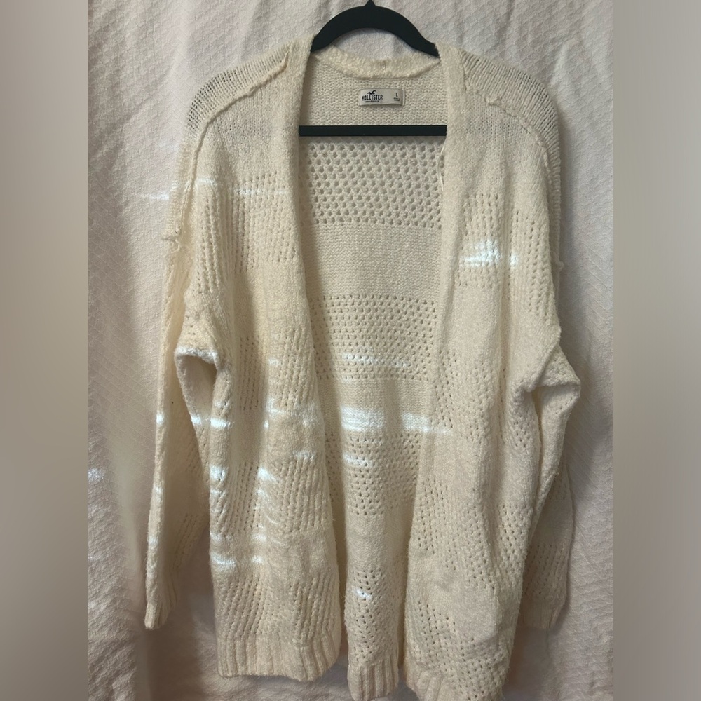 Cream Hollister sweater. No stains or tears.